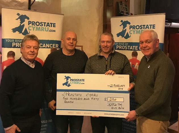 Pictured are Brian Harries and John Daniels of Pembrokeshire friends of Prostate Cymru receiving the cheque from Ian Thomas and Jon Llewhellin