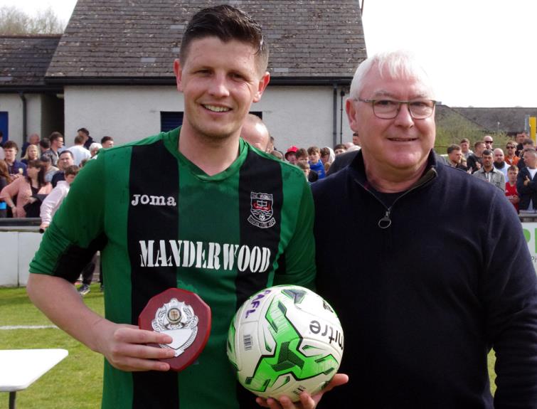Man of the match Jack Britton with Manderwood director Chris Tansey