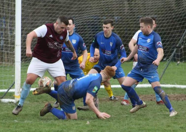 Steve Thomas battles for possession for St Clears. Picture Fraser Watson