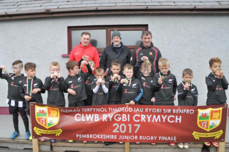 Jason with some of his young charges at Neyland RFC