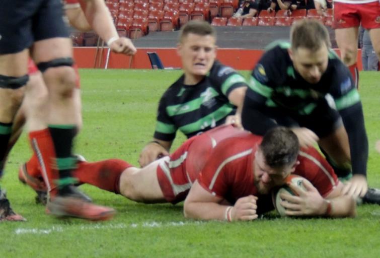 Sam Smith crashes over for a try for Pembroke