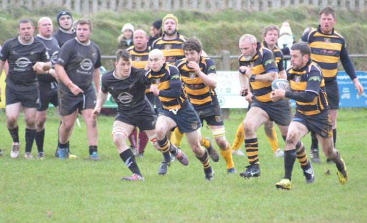 Bryan Phillips makes a break for St Davids at Fishguard Road