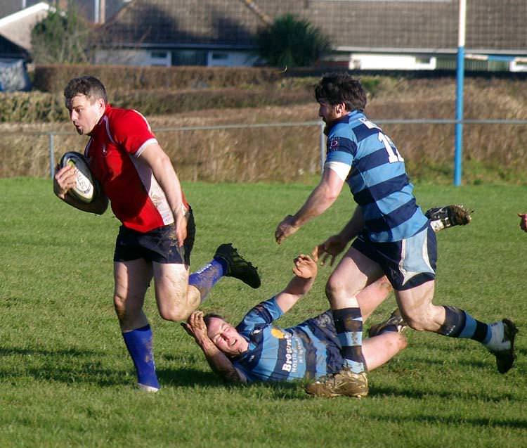 Haverfordwest centre Grant Rogers makes a strong midfield break