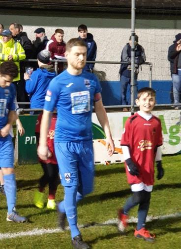Sean Pemberton leads the team onto the Conygar Bridge Meadow