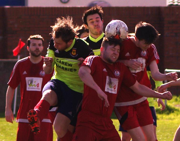 Goalmouth action from Marble Hall where Carew won against Milford United