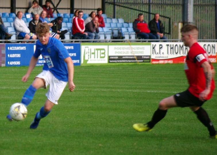 Haverfordwest County left back Harri Rowe has a shot at goal
