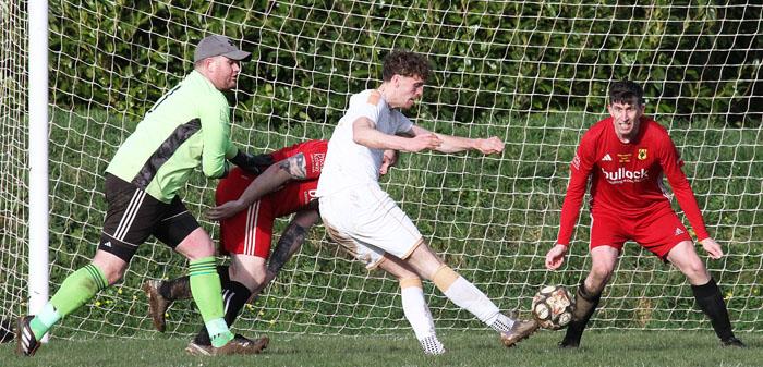 Tom Jago has a shot at goal