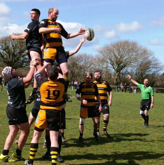 Ian Griffiths wins lineout ball for Llangwm