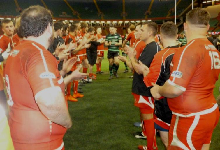 Pembroke players sportingly clap Porthcawl off the pitch