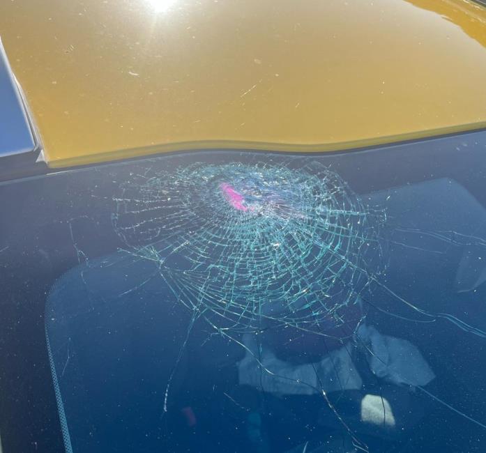 His smashed windscreen