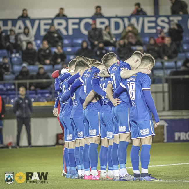Players observed a minutes silence for Mostyn Rowlands. Picture Matthew Kelly - Rawphotography