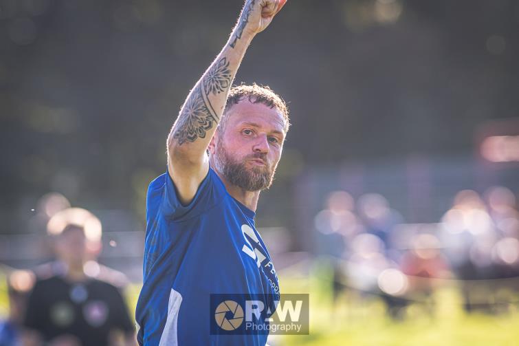 Adam Kingsbeer celebrates scoring twice for Merlins Bridge against Neyland